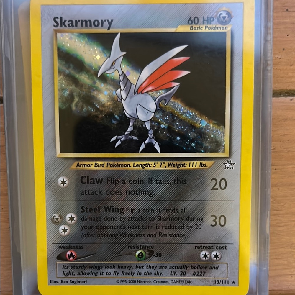 Skarmory Pokémon Card with Red and Silver Design